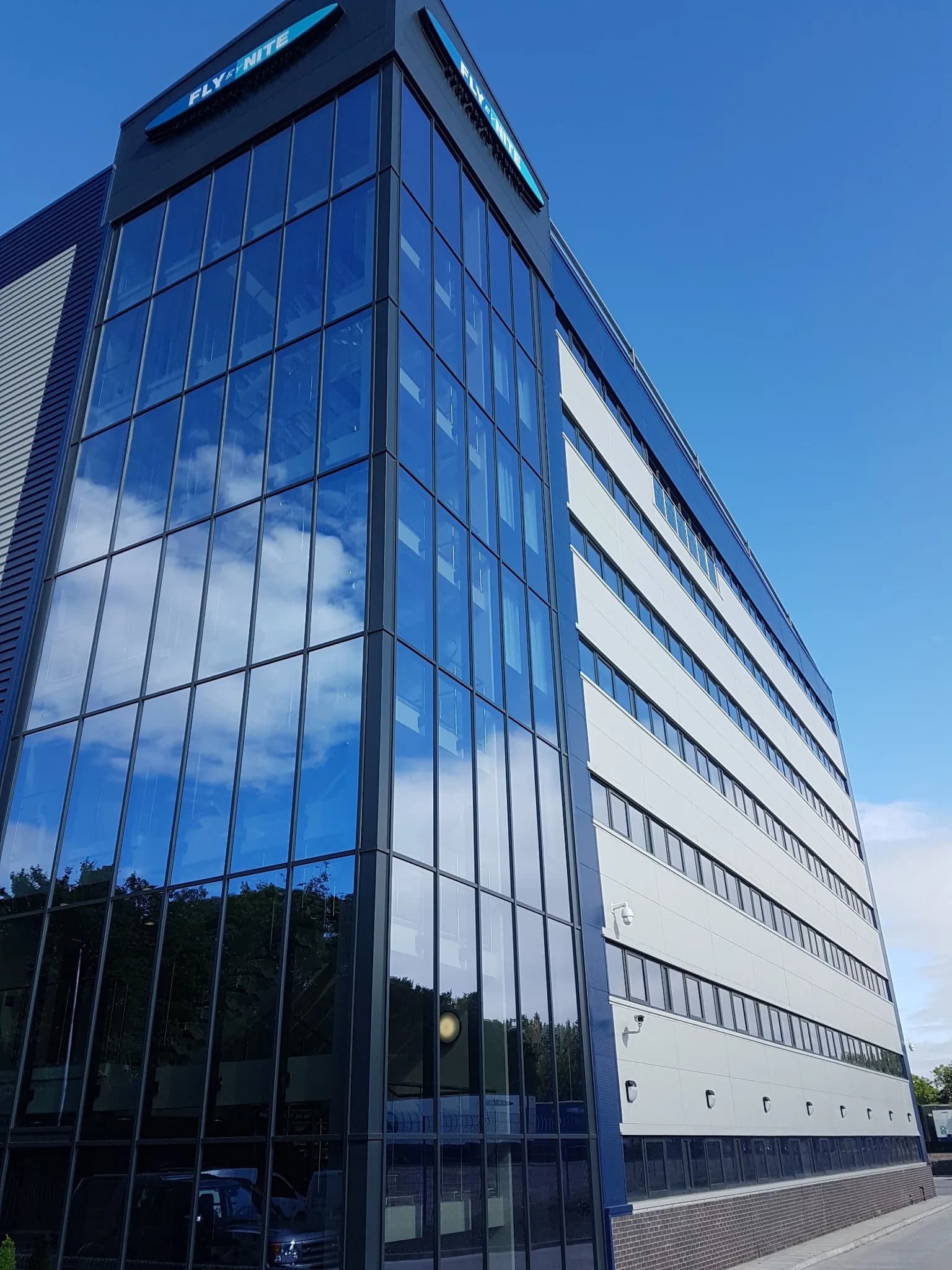 Multi storey commercial glass building window cleaning