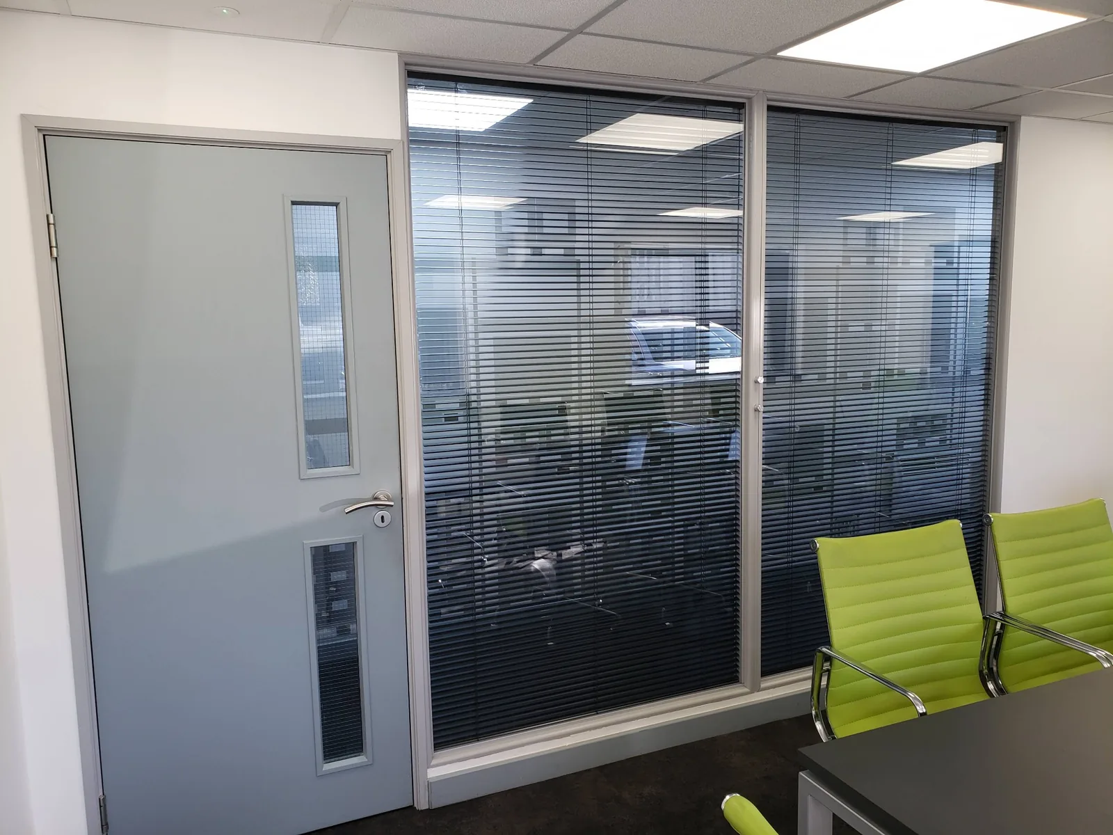 Office partition glass cleaned to a streak-free finish